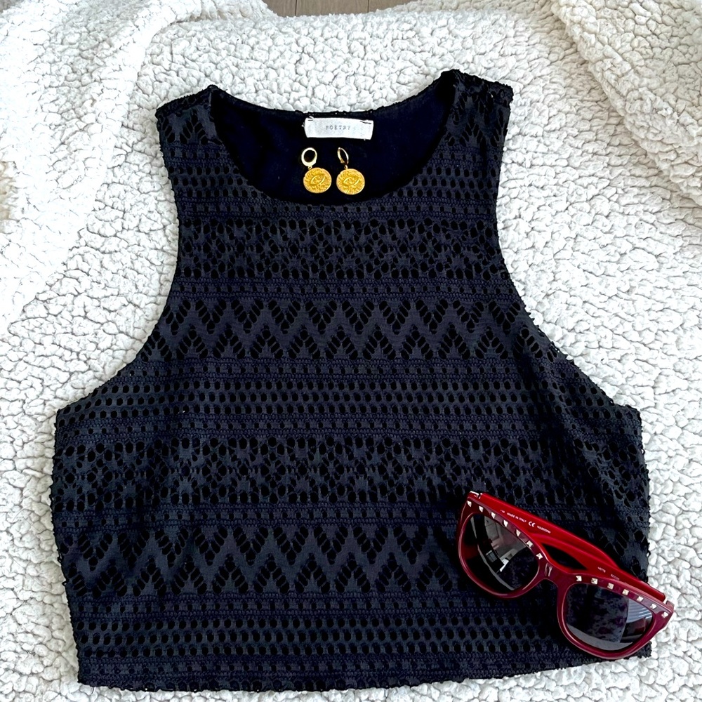 Used black Crop top. Perfect for summer or layerings. (Accessories not included)